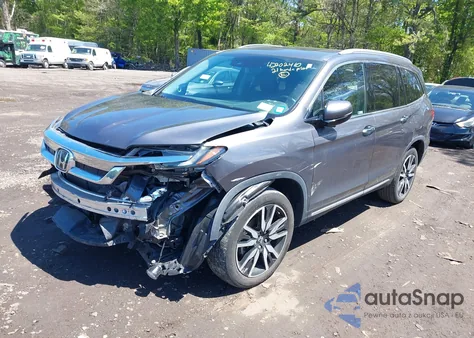 2021 Honda Pilot Awd Touring 8 Passenger from USA, damaged, VIN 5FNYF6H9XMB059037